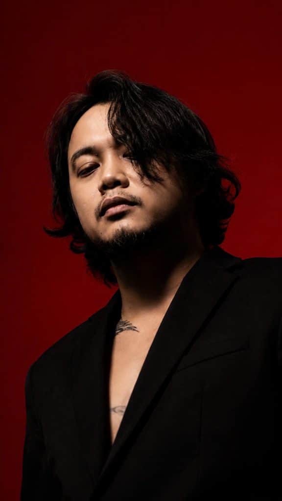 Portrait of Mr. Tùng, Founder and Studio Manager at Tattoo Station Hoi An, specializing in custom tattoo consultation, original tattoo design, and premium tattoo experiences in Hoi An, Vietnam.
