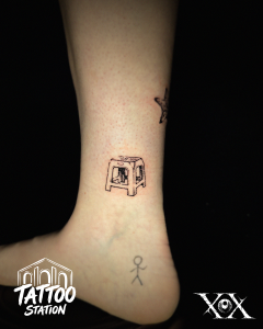 Vietnamese Tattoo featuring the famous Vietnamese plastic stool found on every street corner.