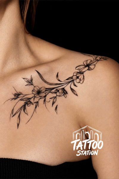 Arina Kiwi Fine Line Tattoo - Custom floral collarbone tattoo at Tattoo Station Hoi An