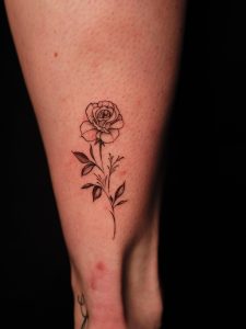 Fine Line Rose Tattoo by Vu Inks at Tattoo Station Hoi An